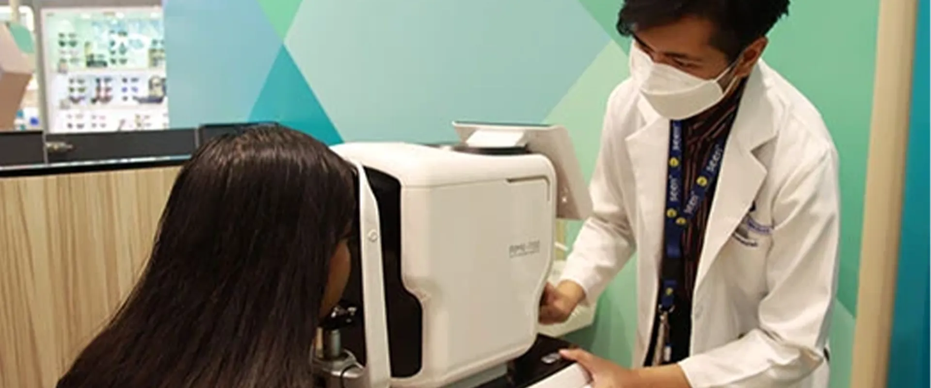 A woman having her eyes checked.