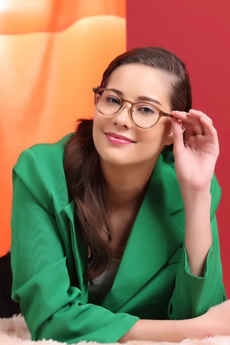 A model wearing bio-acetate frames