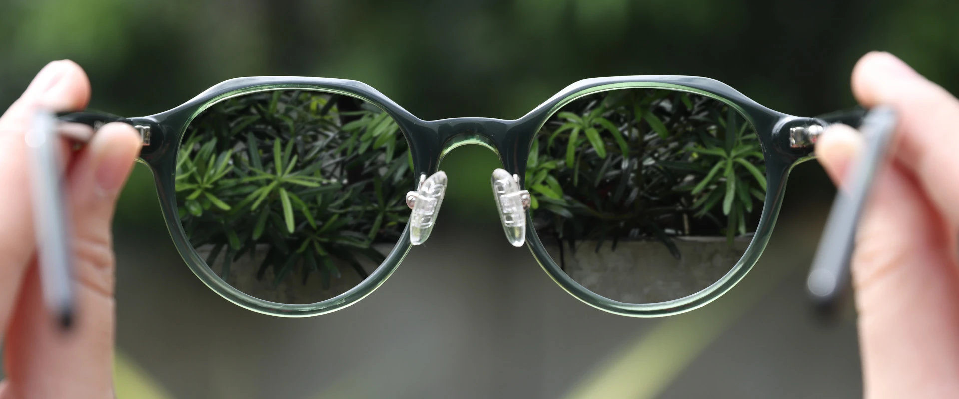 clear eyeglasses with blurred background - earth friendly eyewear
