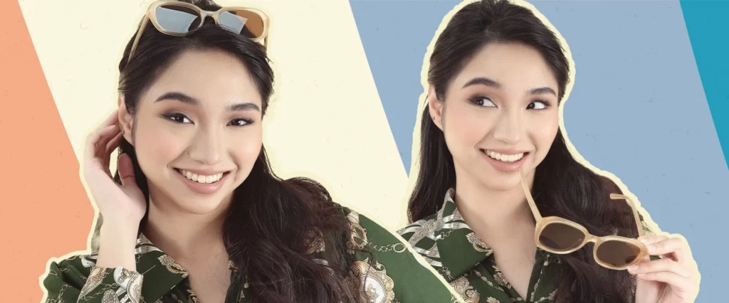 A girl wearing trendy fashion round tinted sunglasses